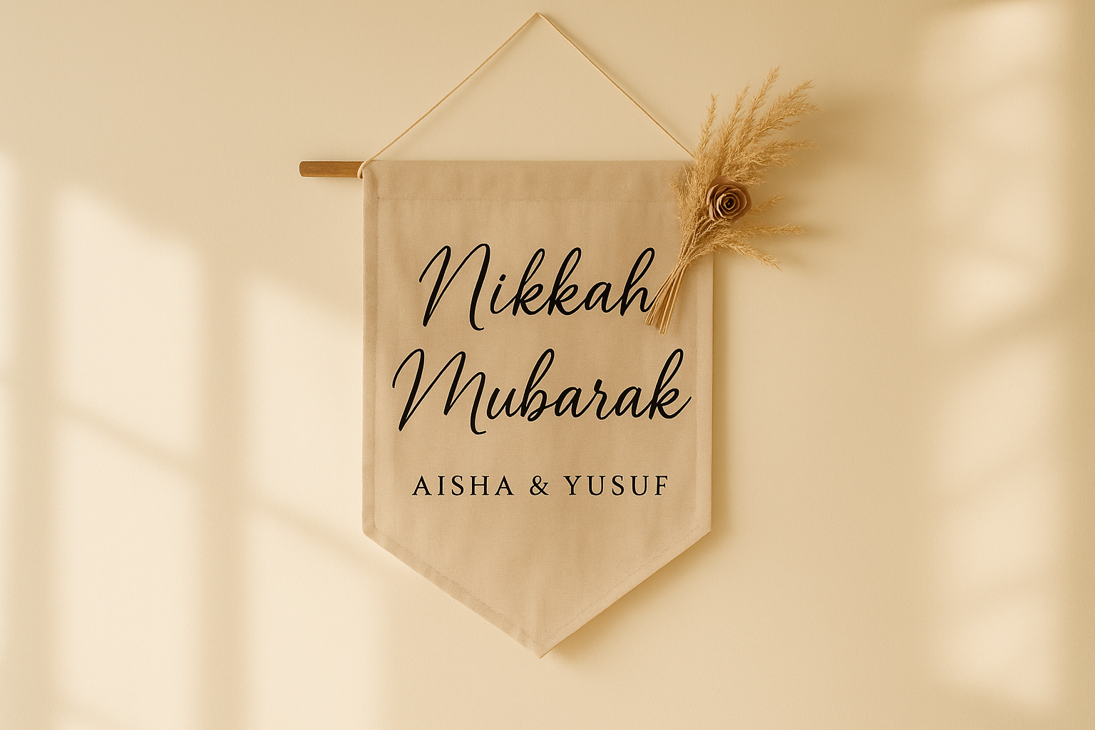 Personalised linen hanging banner reading Nikkah Mubarak, Aisha and Yusuf